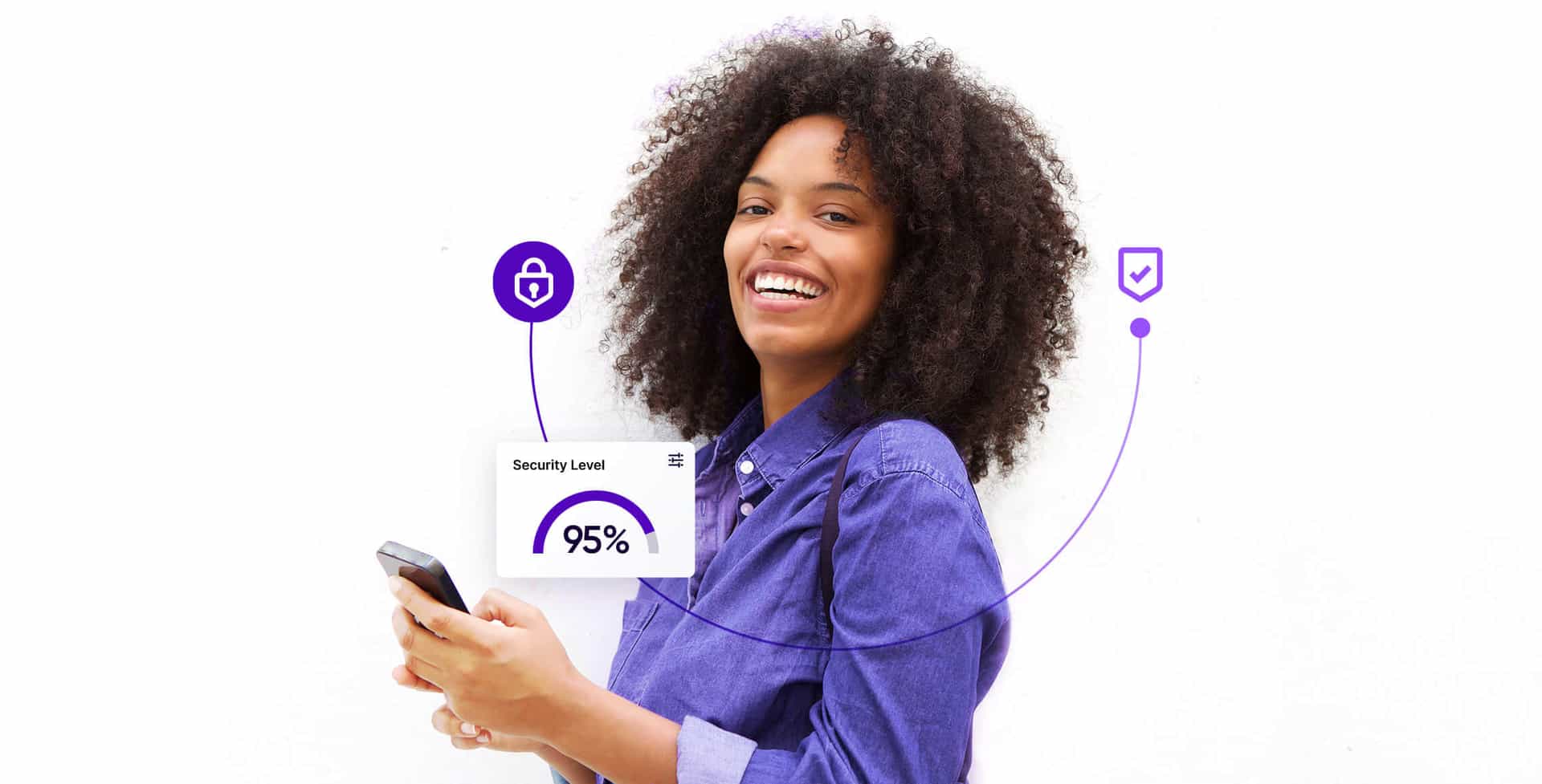 A woman smiles while holding a smartphone